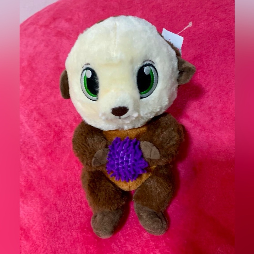 Plush Otter Toy with Purple Ball